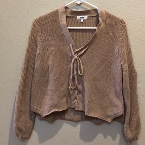 Pink-Nude sweater with crisscrossed front